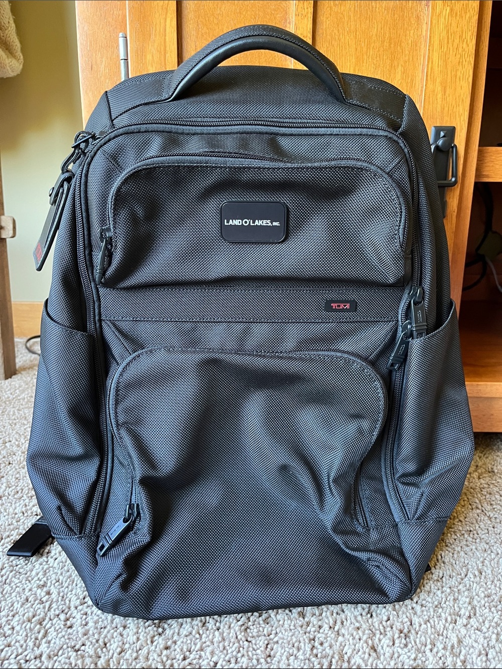 TUMI Corporate Laptop Backpack 22205DE never used. Branded with Land O’Lakes tag